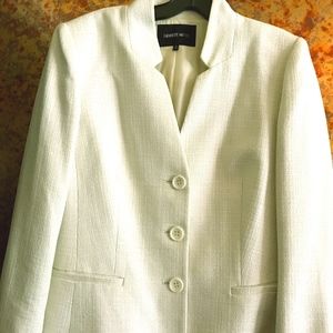 Off white jacket. Looks like new. Shimmery thread.